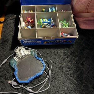 Skylanders Figure Storage Case with Portal of Power, figures, and vehicles